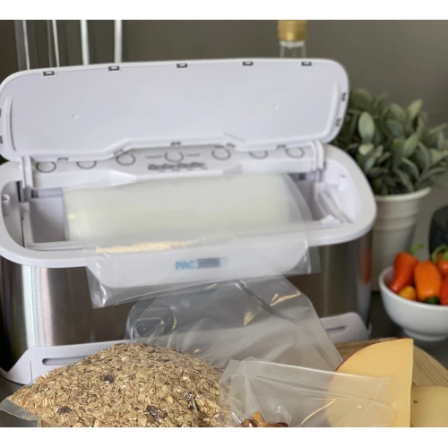 Grey and white vacuum sealer with lid open