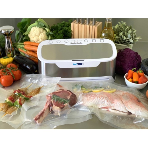 Grey and white vacuum sealer with vacuumed sealed fish